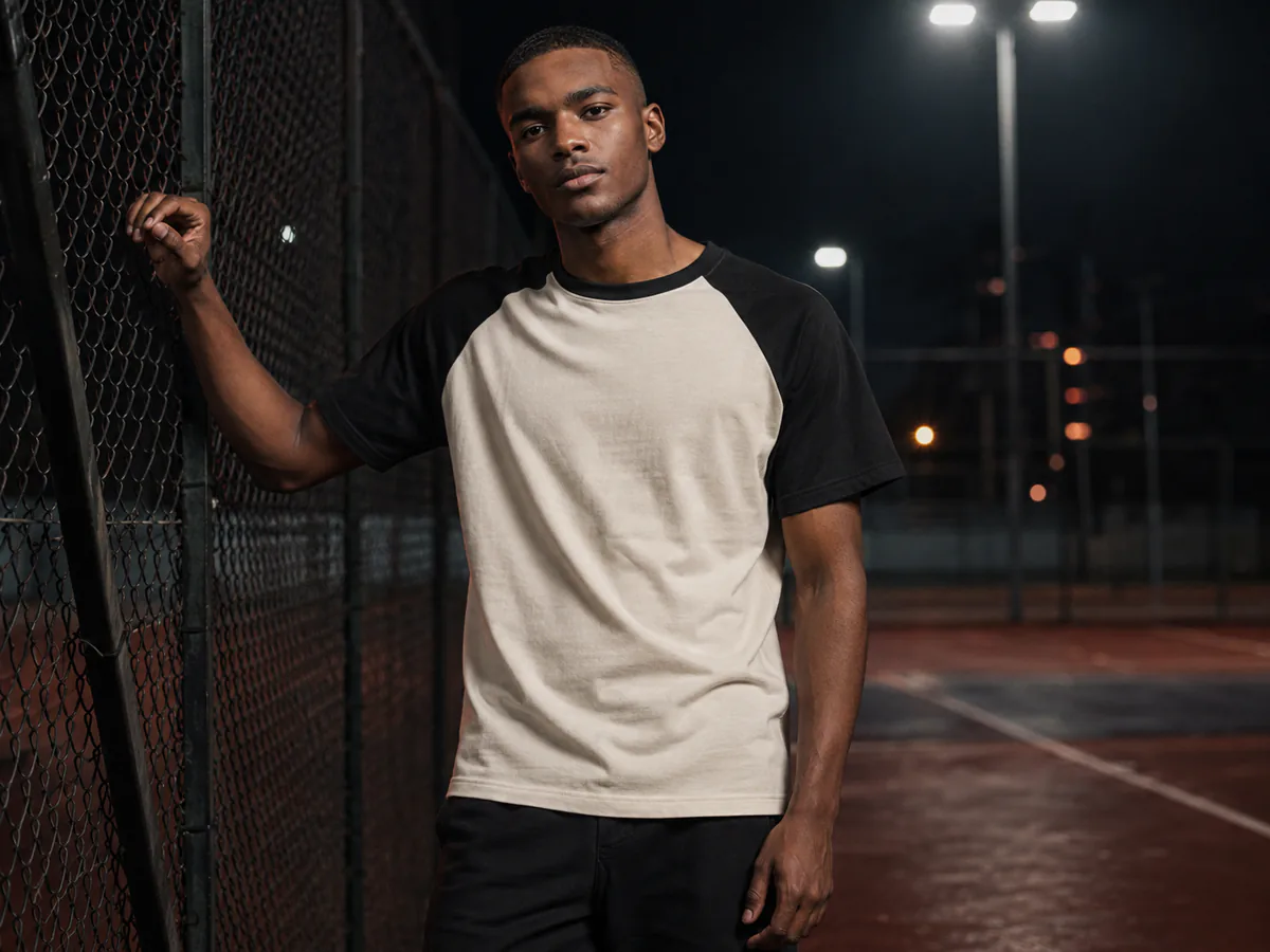 Male model wearing a contrast-sleeve raglan T-shirt