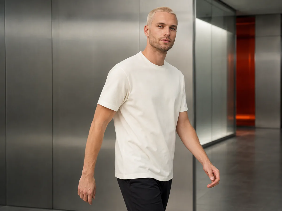 Male model wearing a white regular commercial-fit T-shirt