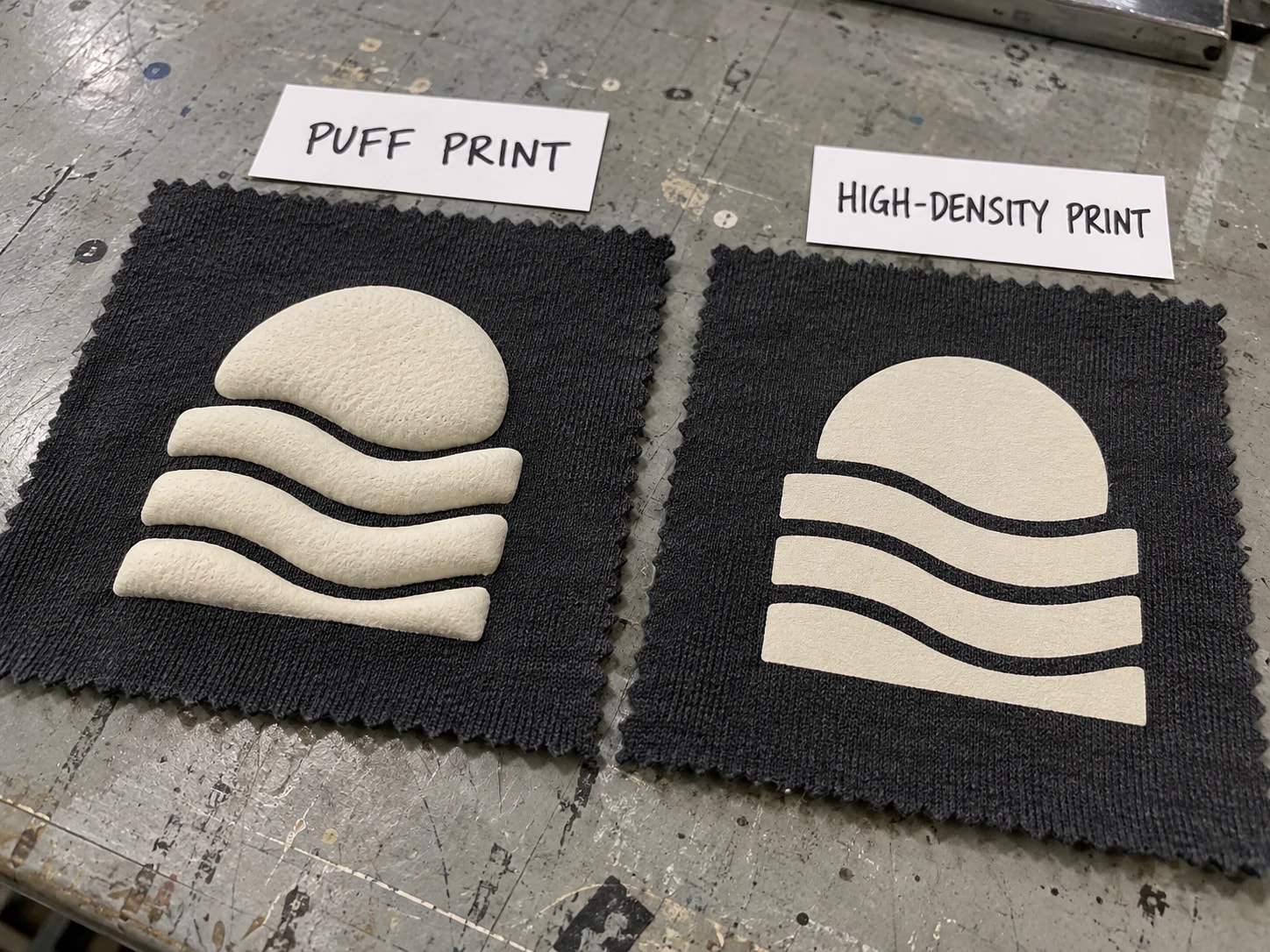 Labeled puff-print and high-density-print fabric swatches with raised cream graphics