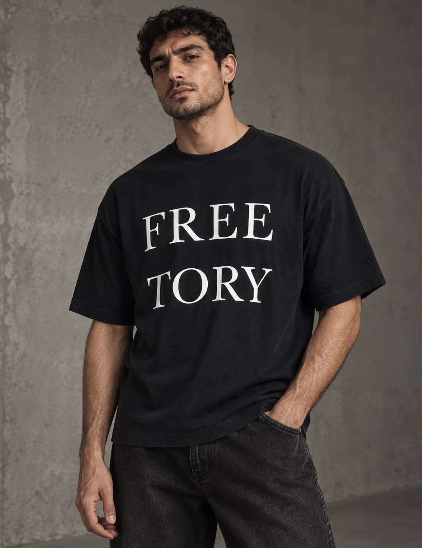 Male model wearing a black boxy fit T-shirt with a large two-line white chest graphic