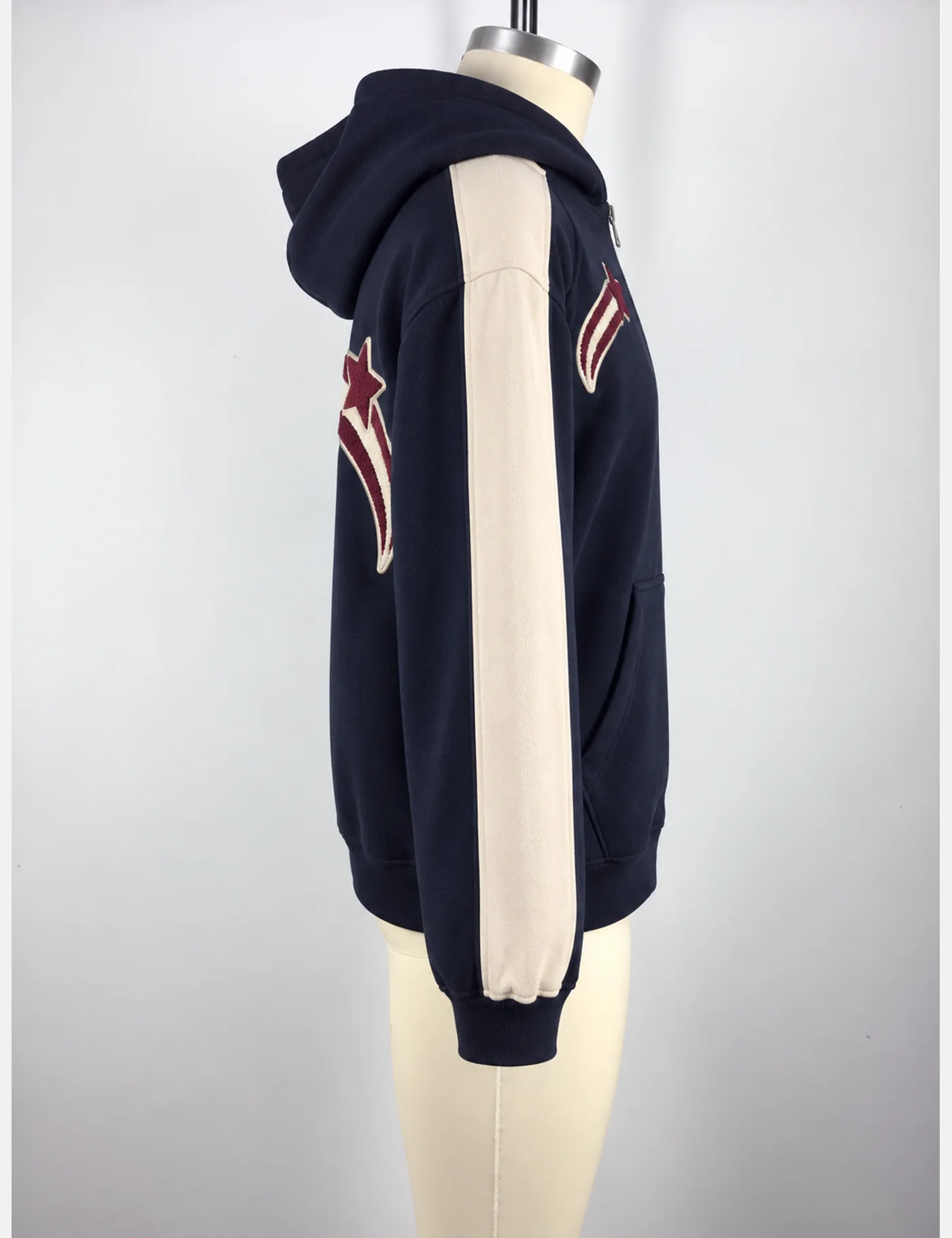 Actual chenille shooting-star zip hoodie sample shown from the side on a mannequin