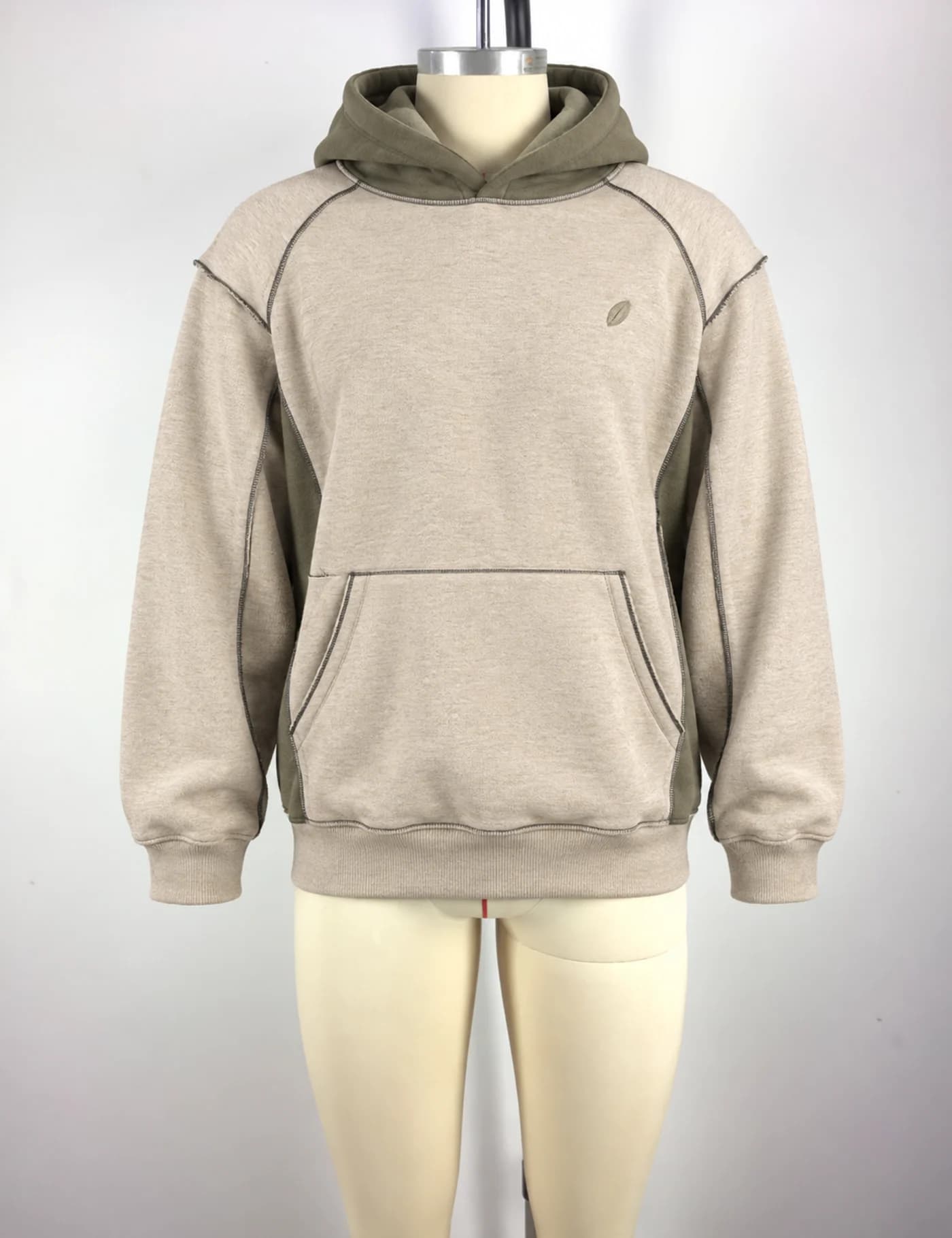 Actual color-block raglan pullover hoodie sample shown from the front on a mannequin
