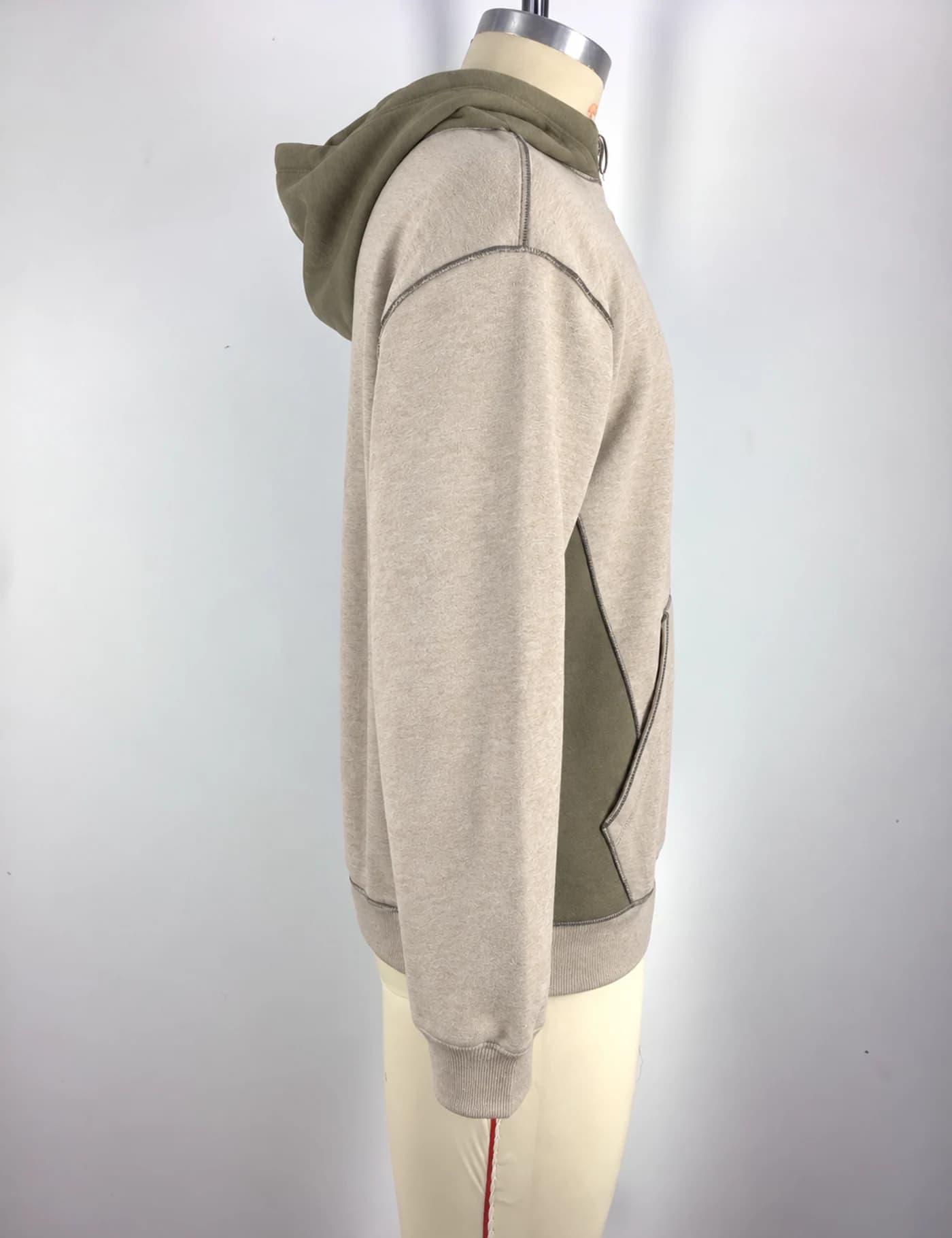 Actual color-block raglan pullover hoodie sample shown from the side on a mannequin