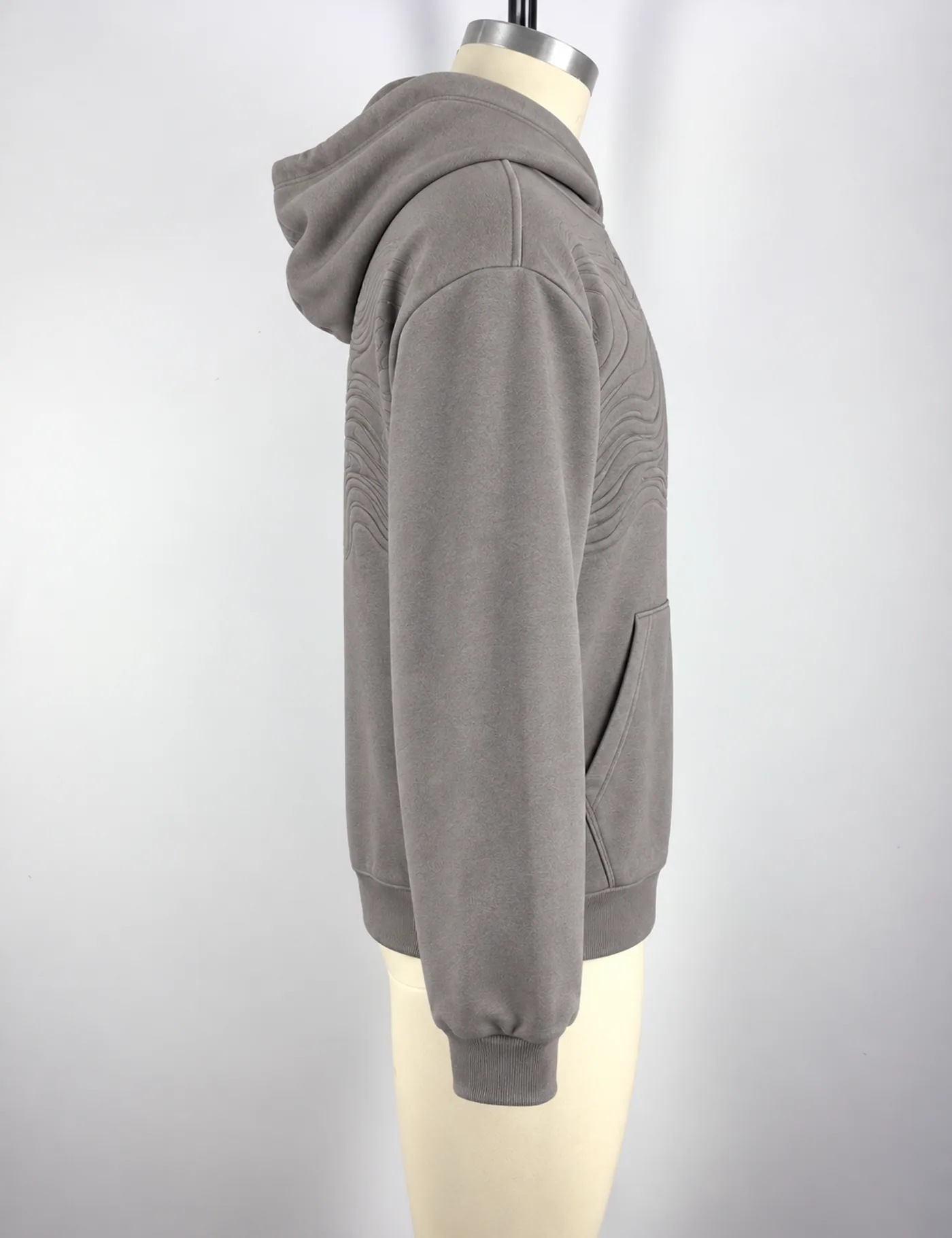 Actual contour-quilted pullover hoodie sample shown from the side on a mannequin