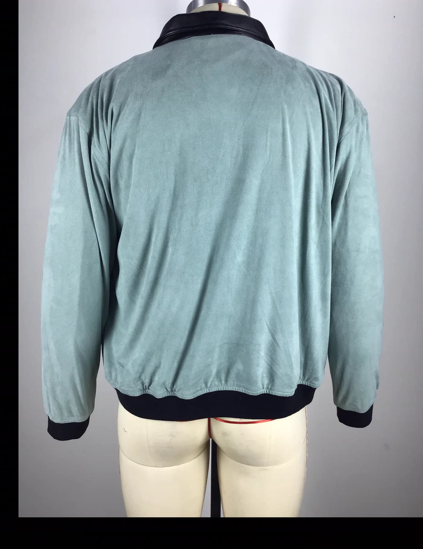Actual contrast collar bomber jacket sample shown from the back on a mannequin