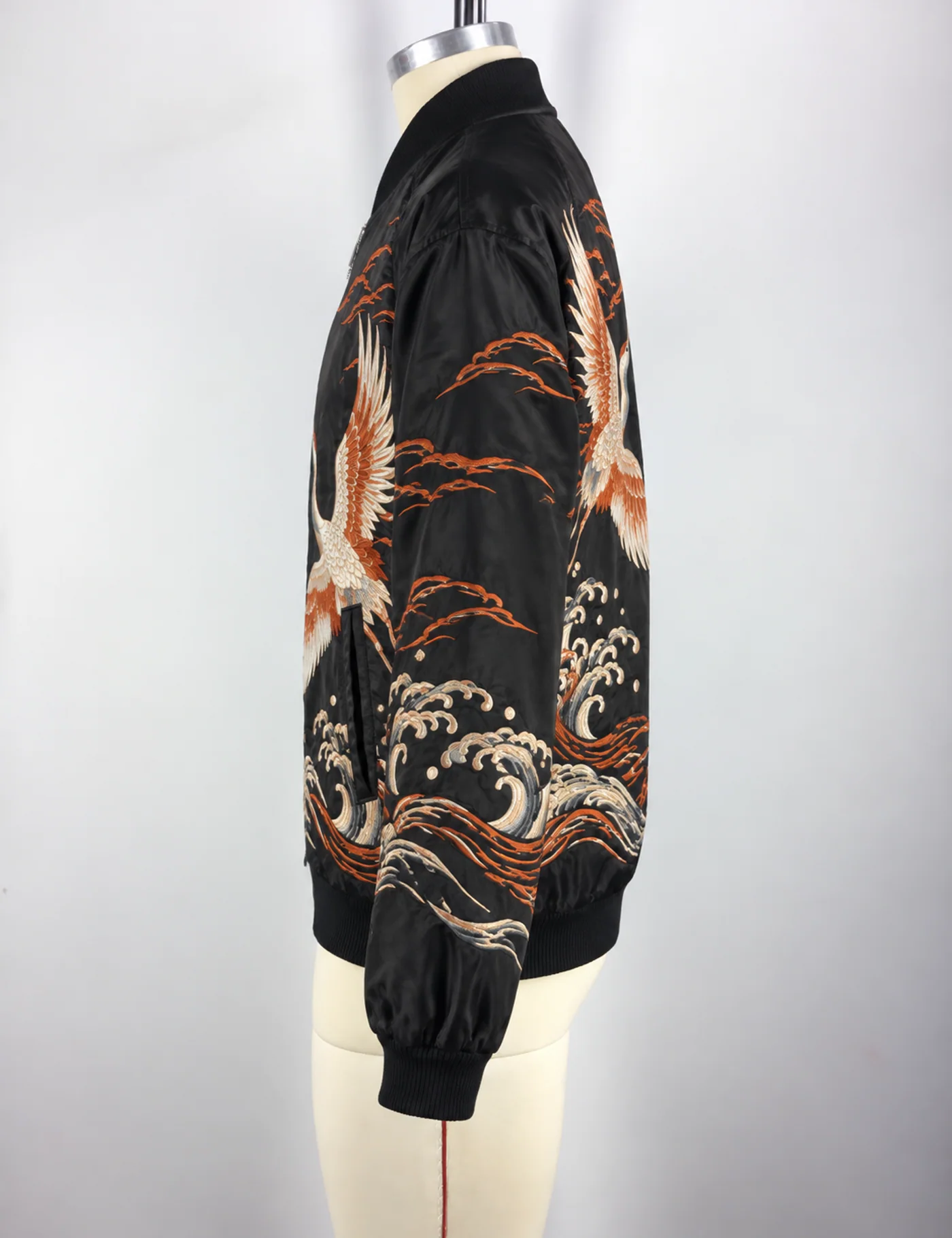 Actual embroidered souvenir jacket sample shown from the side on a mannequin