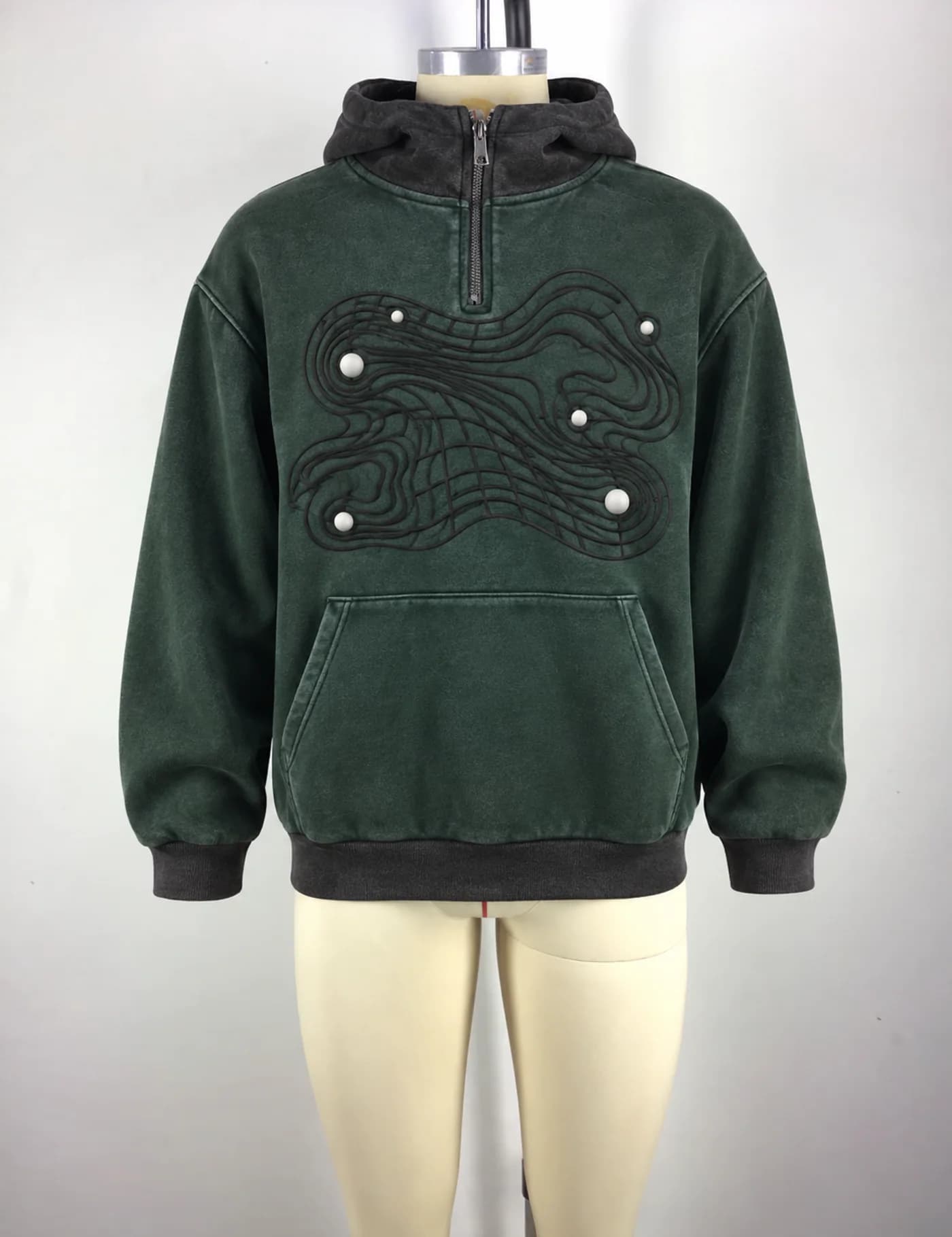 Actual hooded quarter-zip sweatshirt sample shown from the front on a mannequin