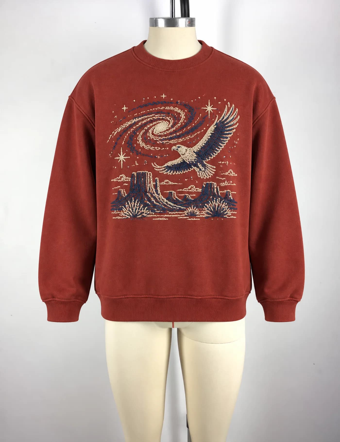 Actual large embroidery crewneck sweatshirt sample shown from the front on a mannequin