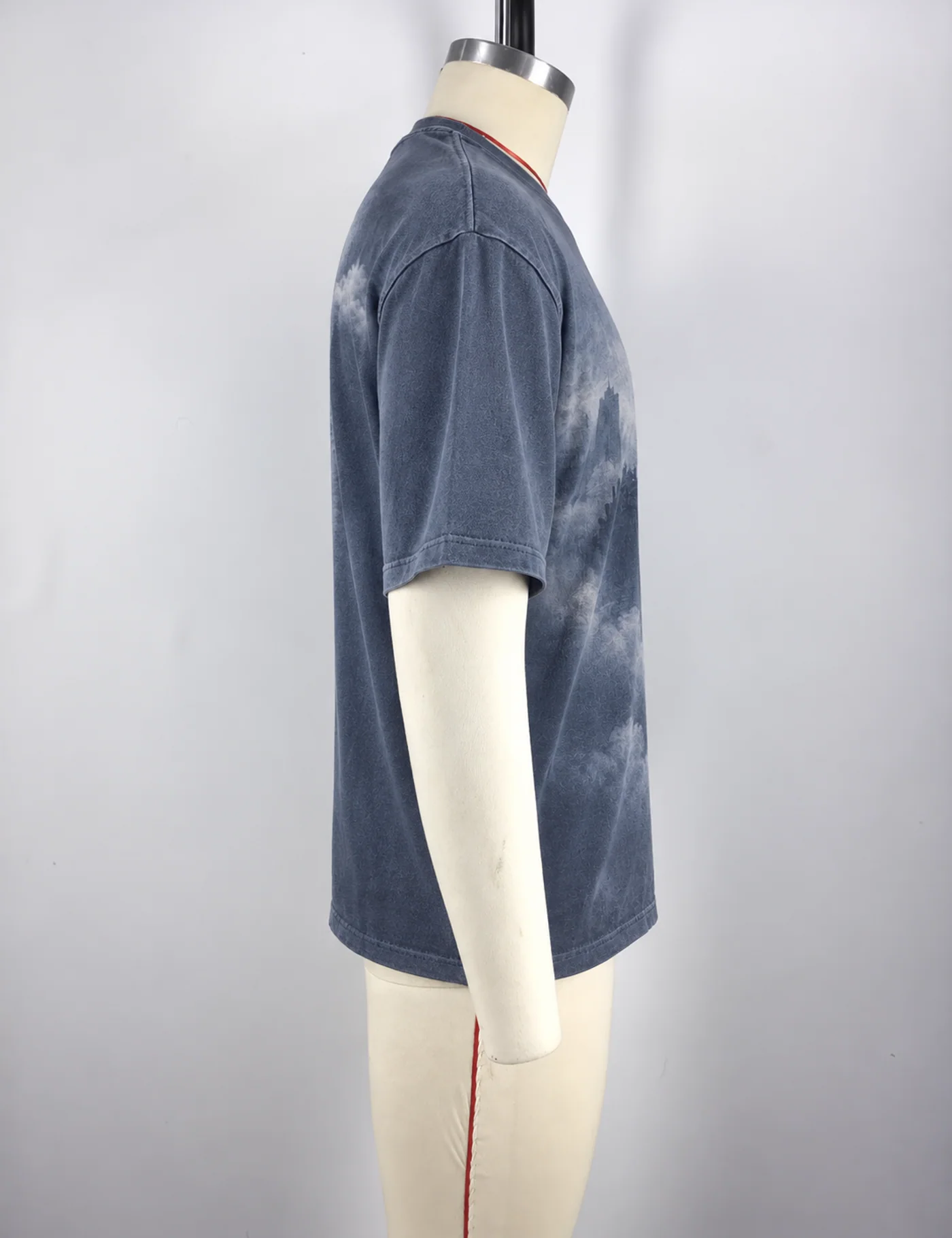 Actual photographic graphic t-shirt sample shown from the side on a mannequin