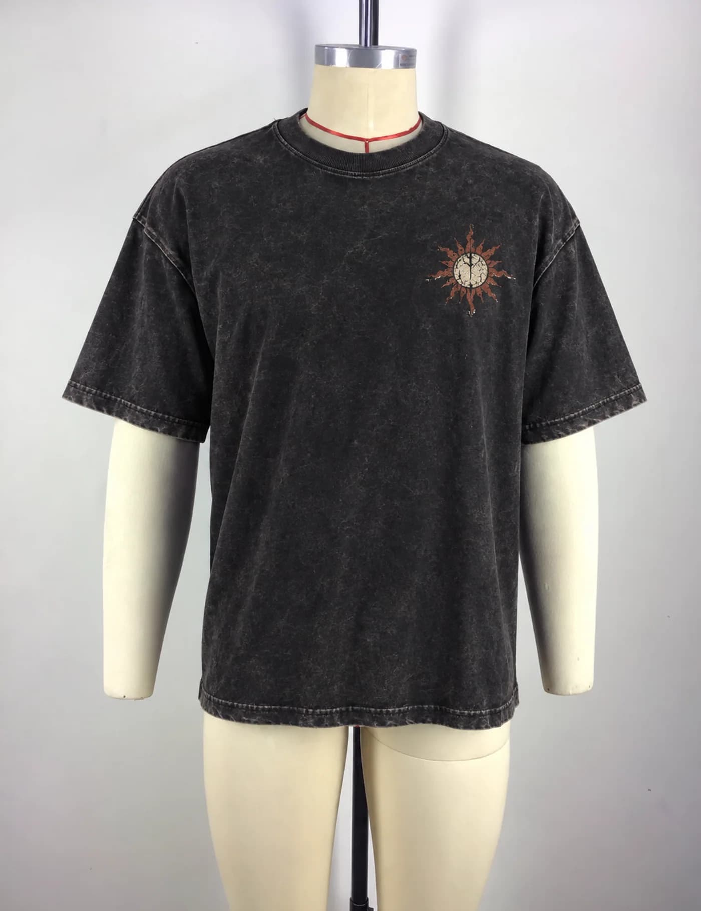 Actual vintage cracked print t-shirt sample shown from the front on a mannequin