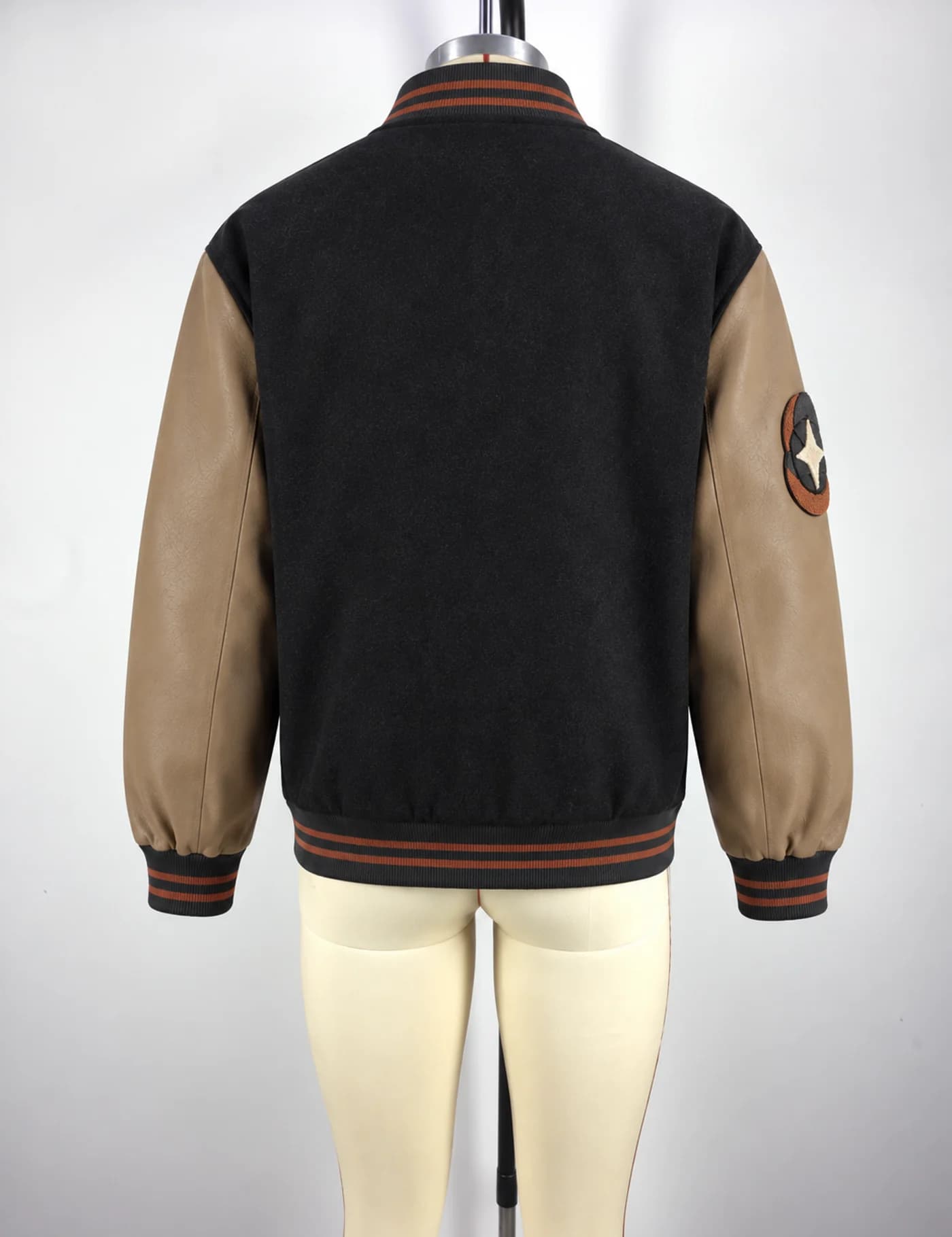 Actual embroidered patch varsity jacket sample shown from the back on a mannequin