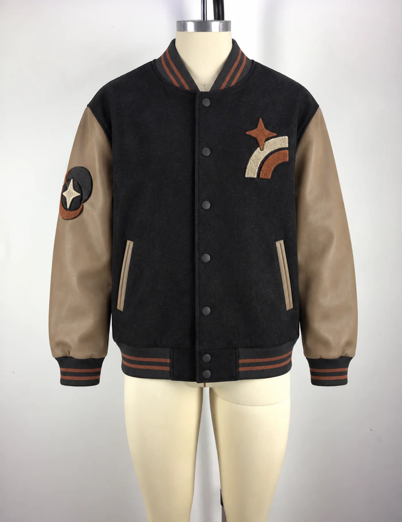 Actual embroidered patch varsity jacket sample shown from the front on a mannequin
