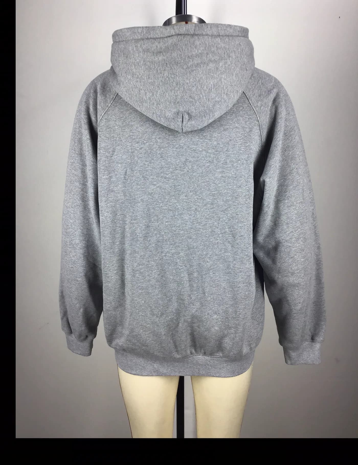 Actual gray full-zip hoodie sample shown from the back on a mannequin