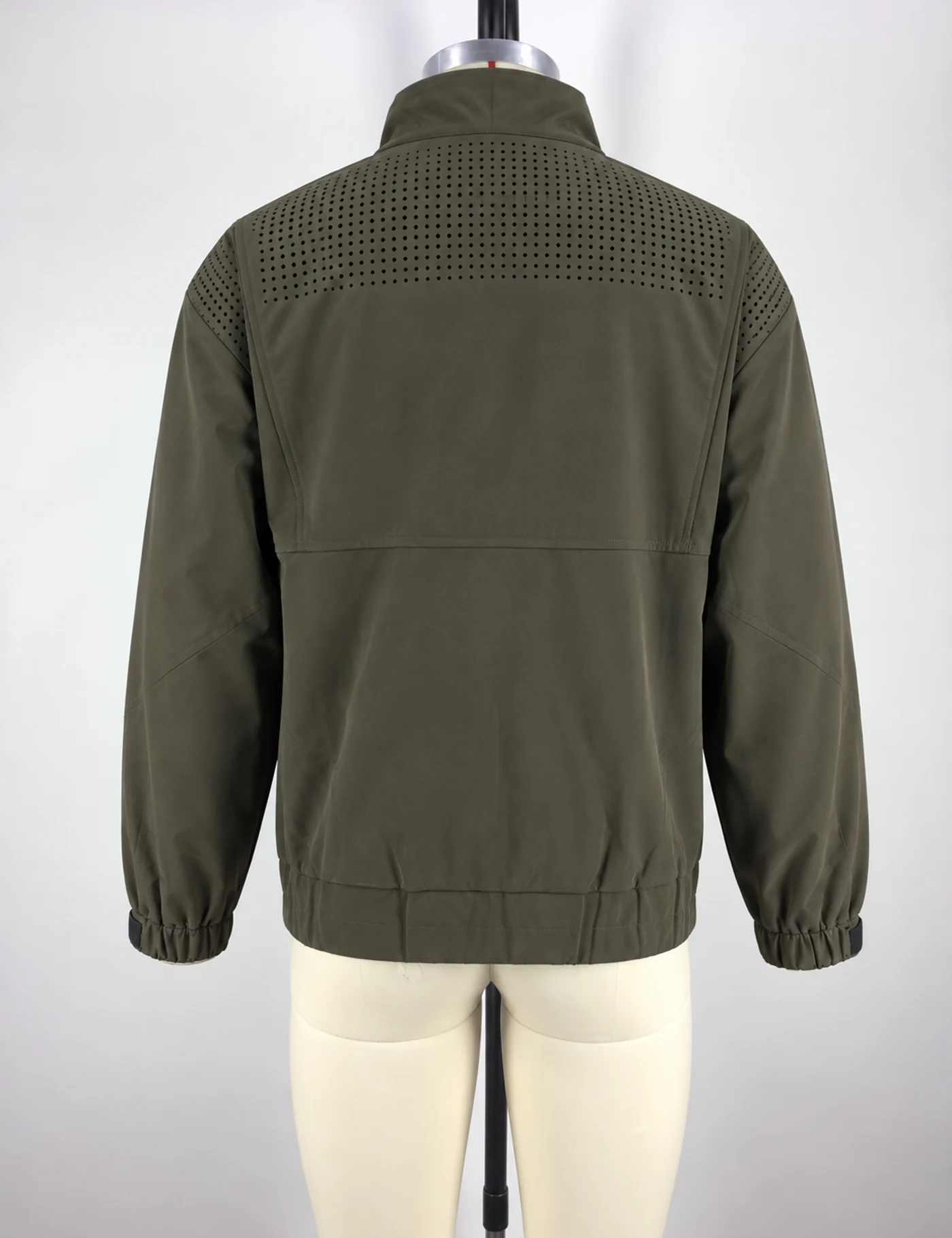 Actual multi-pocket stand-collar utility jacket sample shown from the back on a mannequin