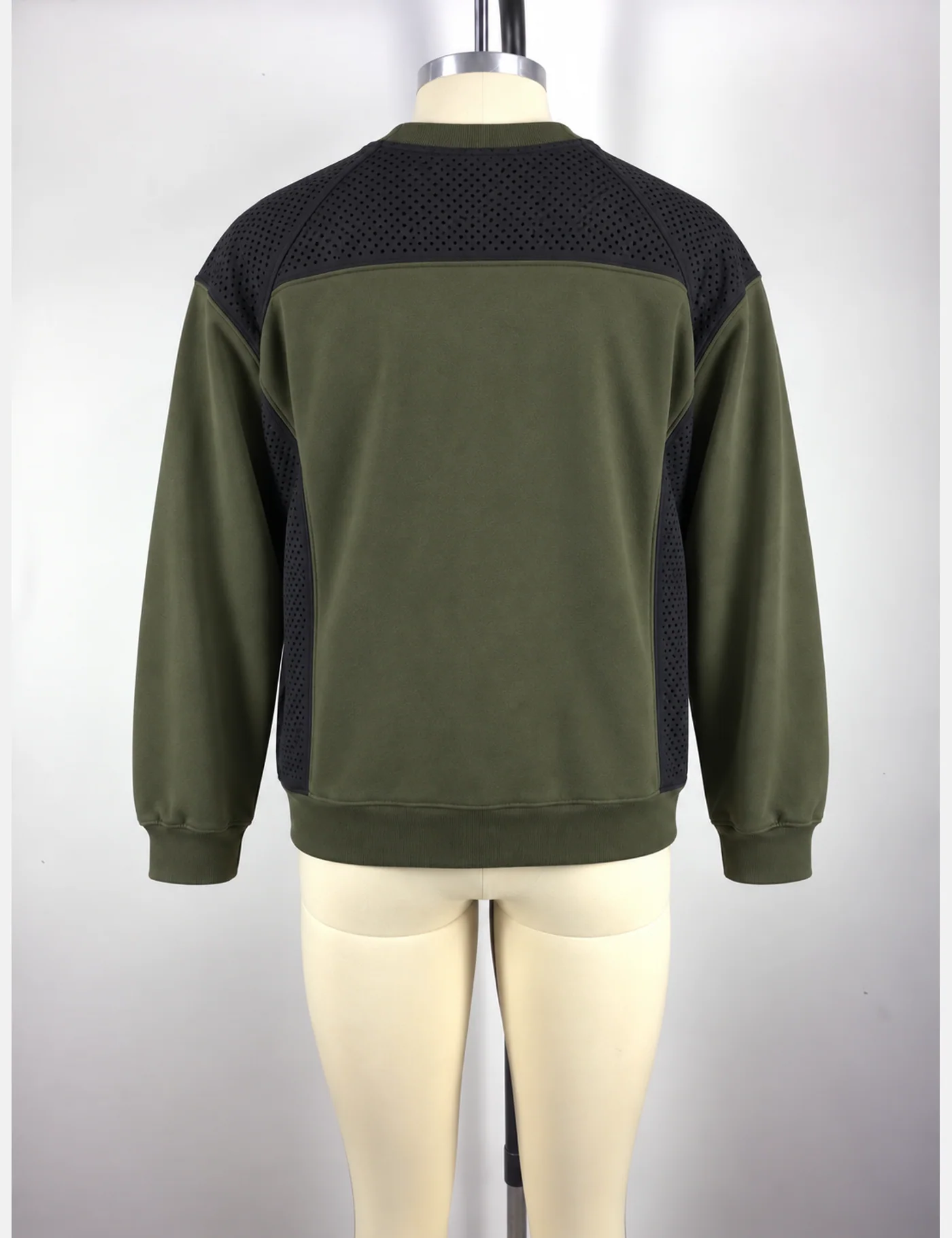 Actual perforated-panel utility crewneck sweatshirt sample shown from the back on a mannequin