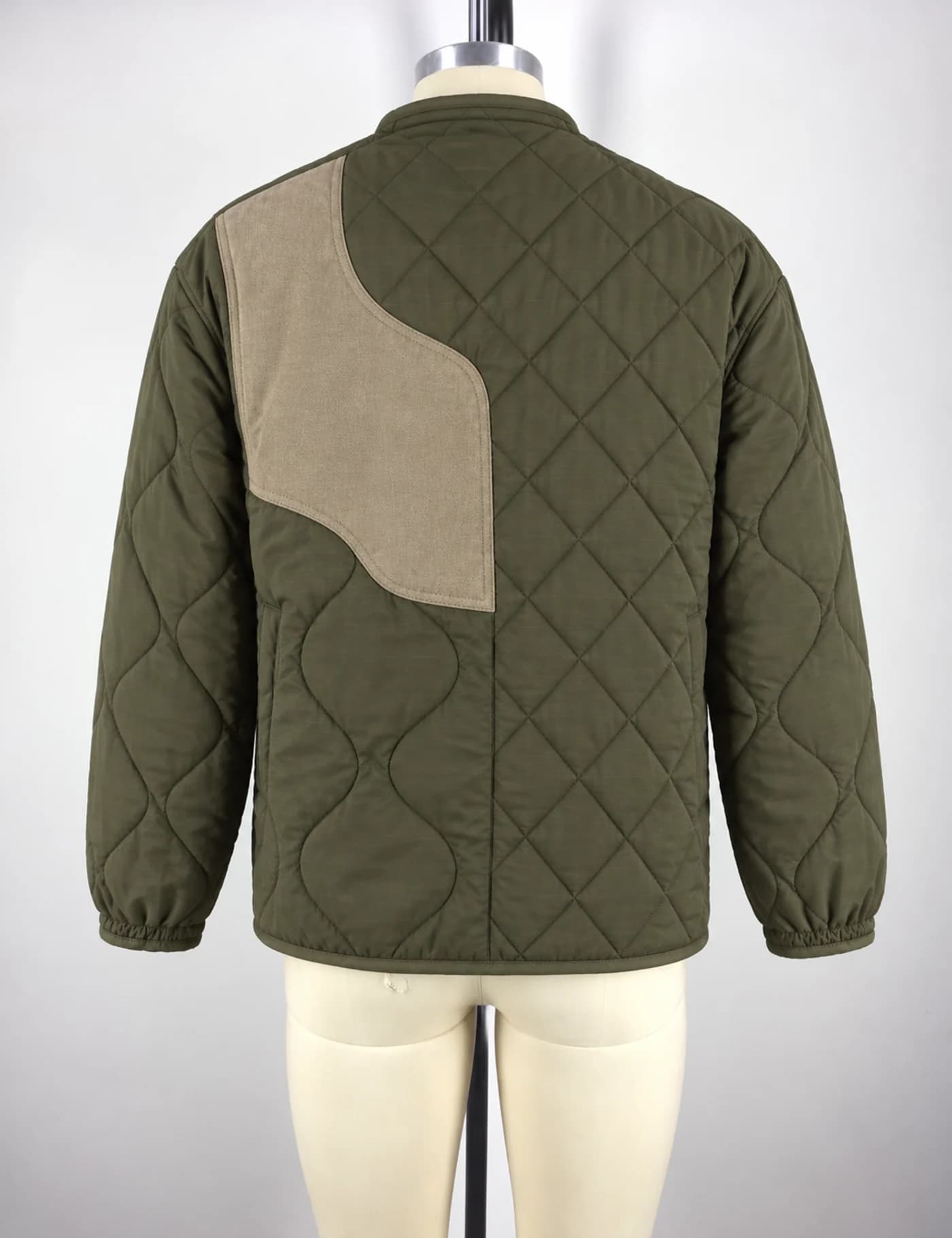 Actual quilted patchwork jacket sample shown from the back on a mannequin