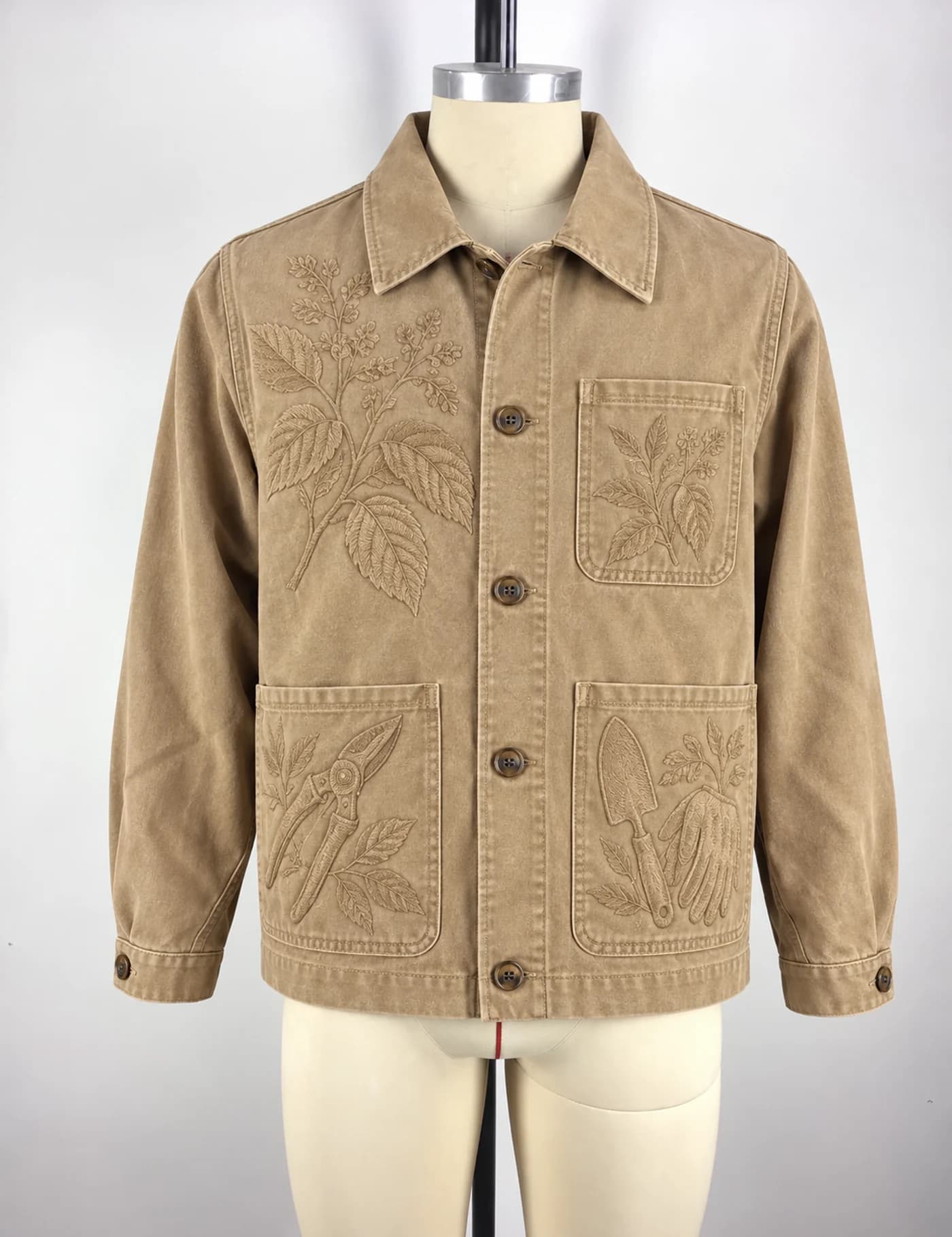 Actual tonal embroidery chore jacket sample shown from the front on a mannequin