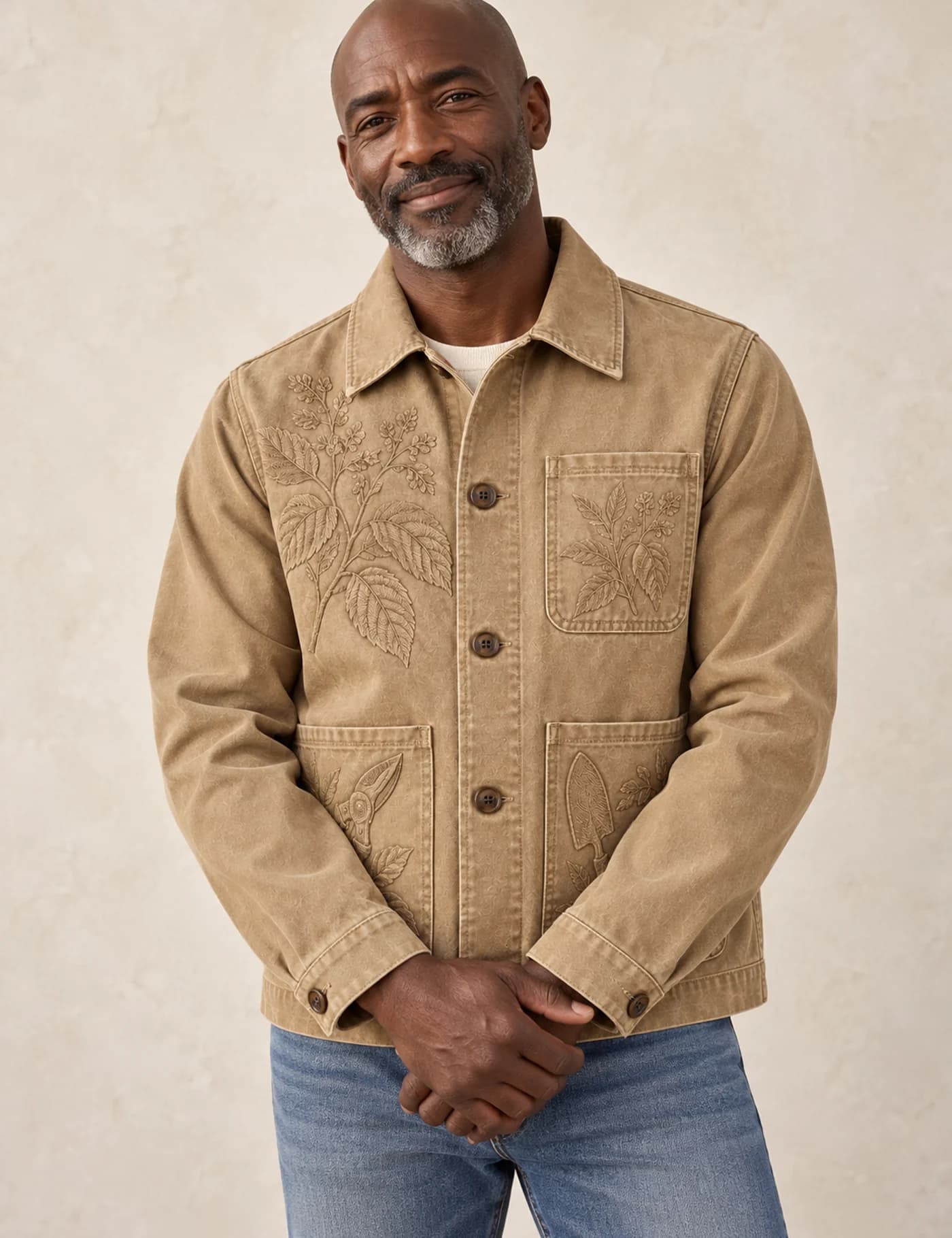 Mature Black male model wearing a sand tonal-embroidery chore jacket