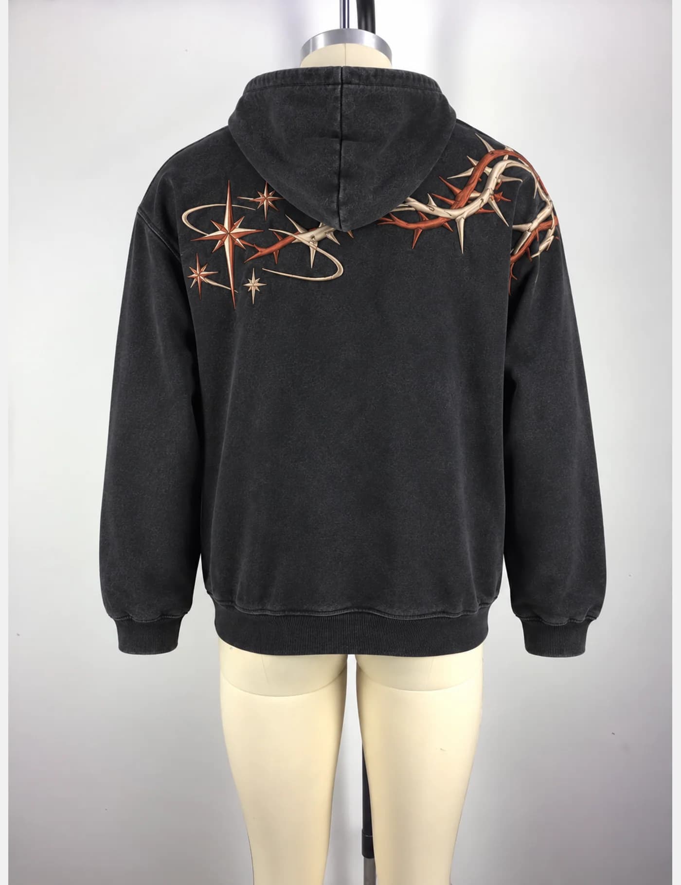 Actual washed barbed-vine embroidered hoodie sample shown from the back on a mannequin