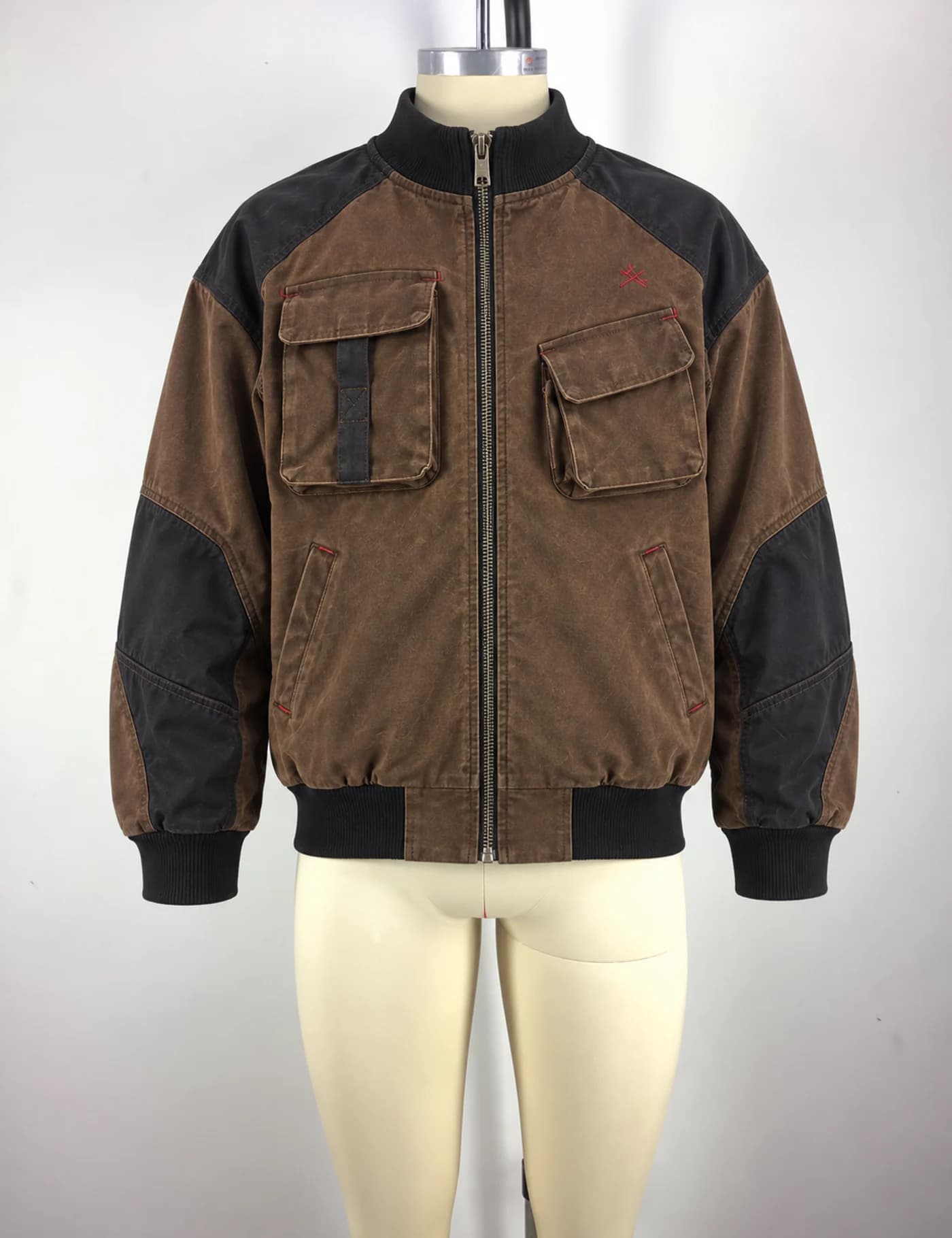 Actual washed color-block utility bomber jacket sample shown from the front on a mannequin