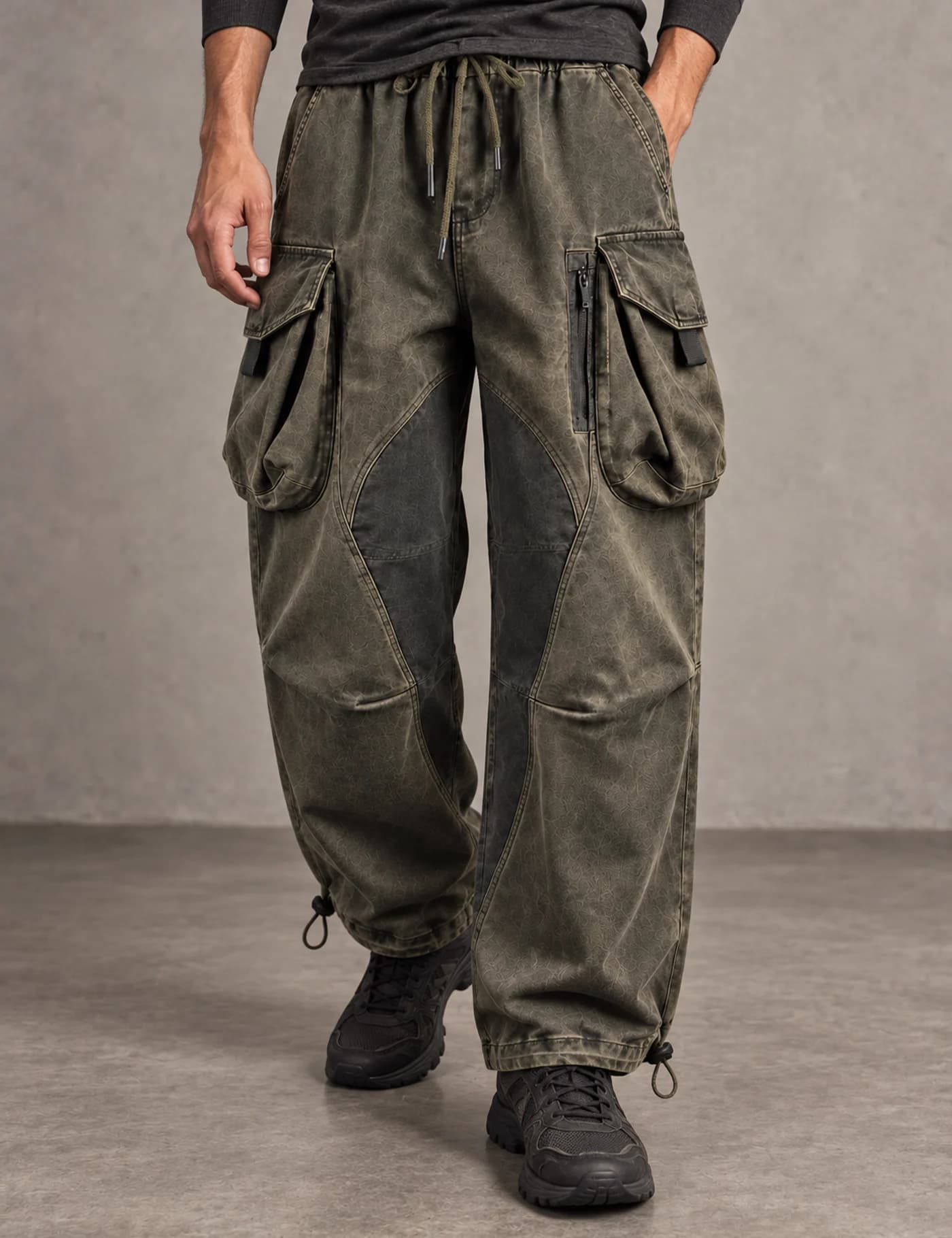Lower-body view of a male model wearing washed olive wide-leg multi-pocket cargo pants