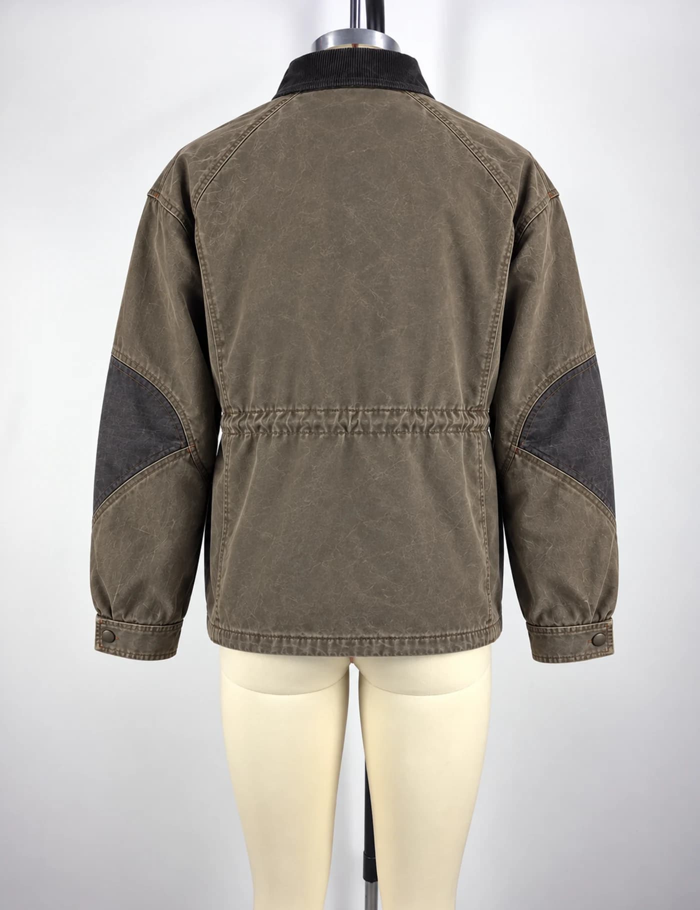 Actual washed multi-pocket field jacket sample shown from the back on a mannequin