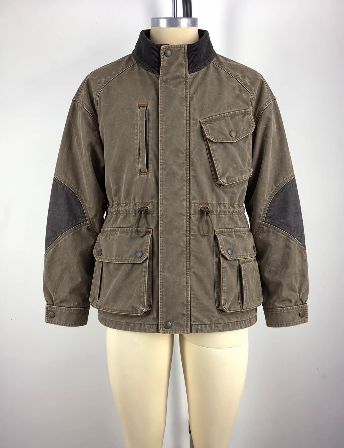 Actual washed multi-pocket field jacket sample shown from the front on a mannequin