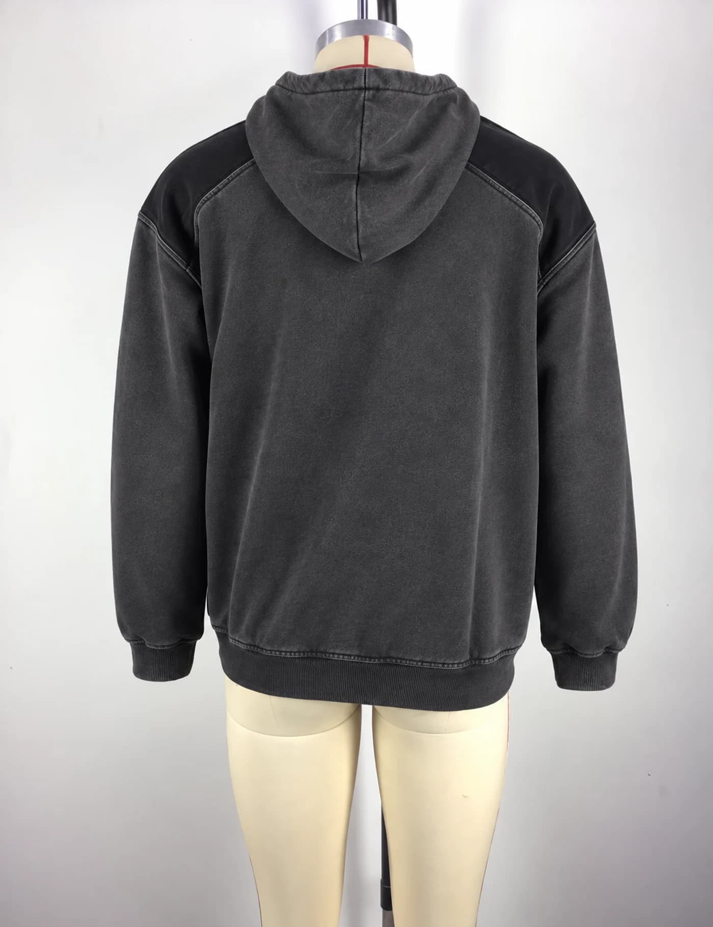 Actual washed tonal embroidered pullover hoodie sample shown from the back on a mannequin