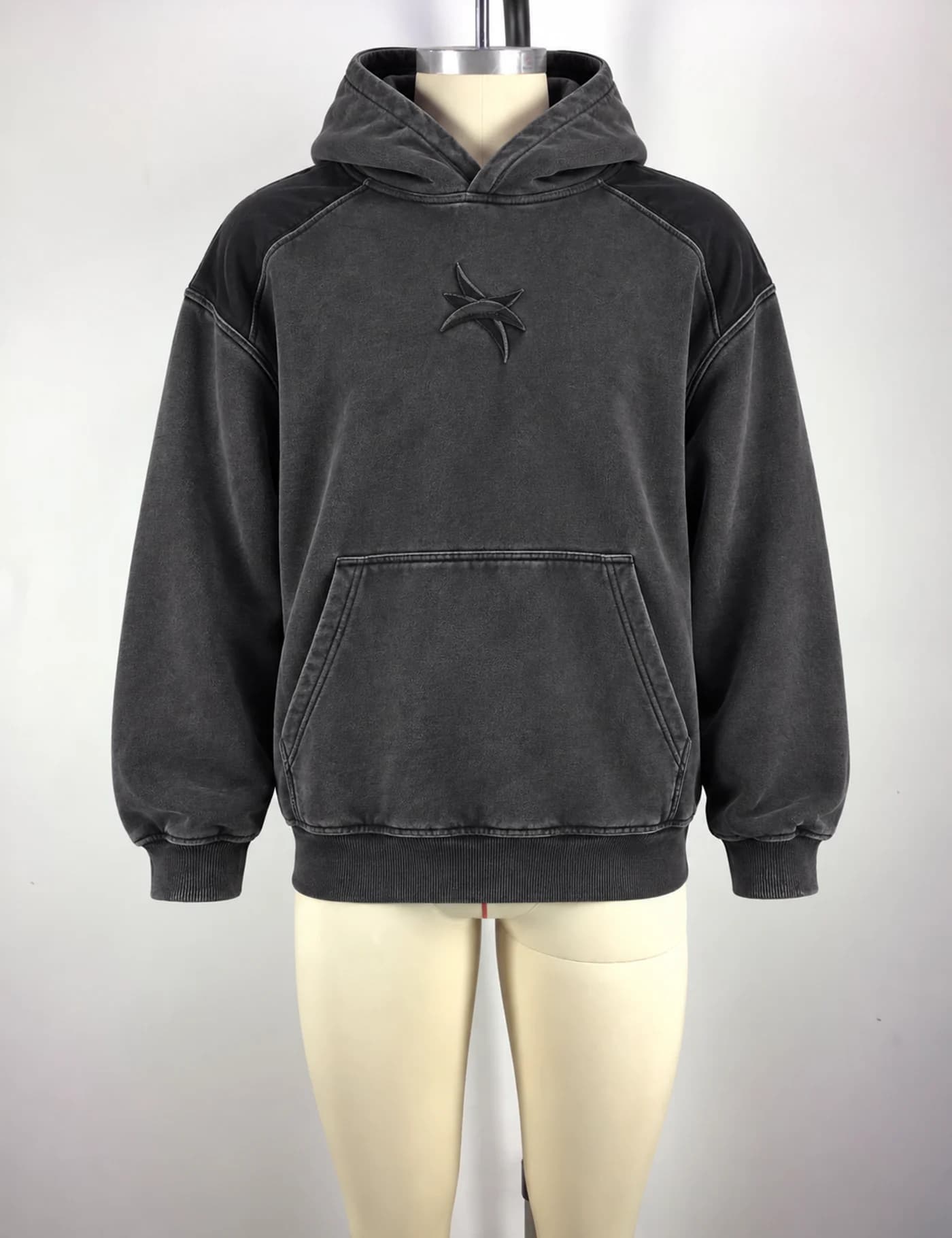 Actual washed tonal embroidered pullover hoodie sample shown from the front on a mannequin
